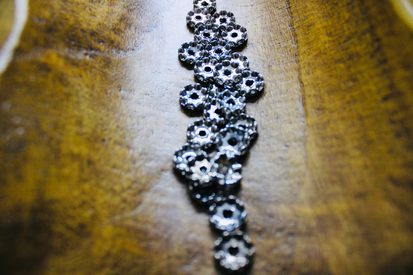 12mm Gunmetal Clear Stone Rhinestone Wavy Spacer Bead 40 Count Bag