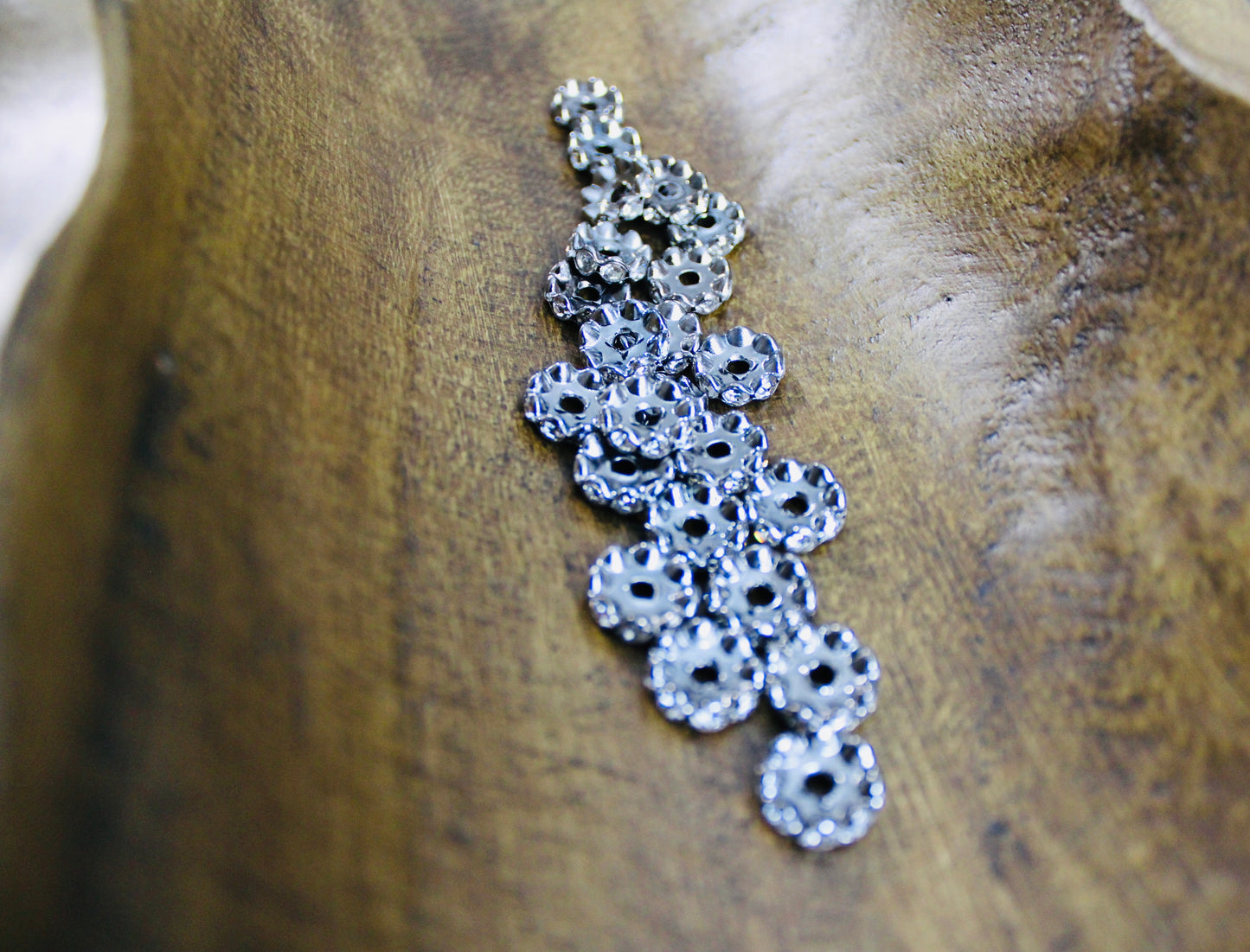 12mm Gunmetal Clear Stone Rhinestone Wavy Spacer Bead 40 Count Bag