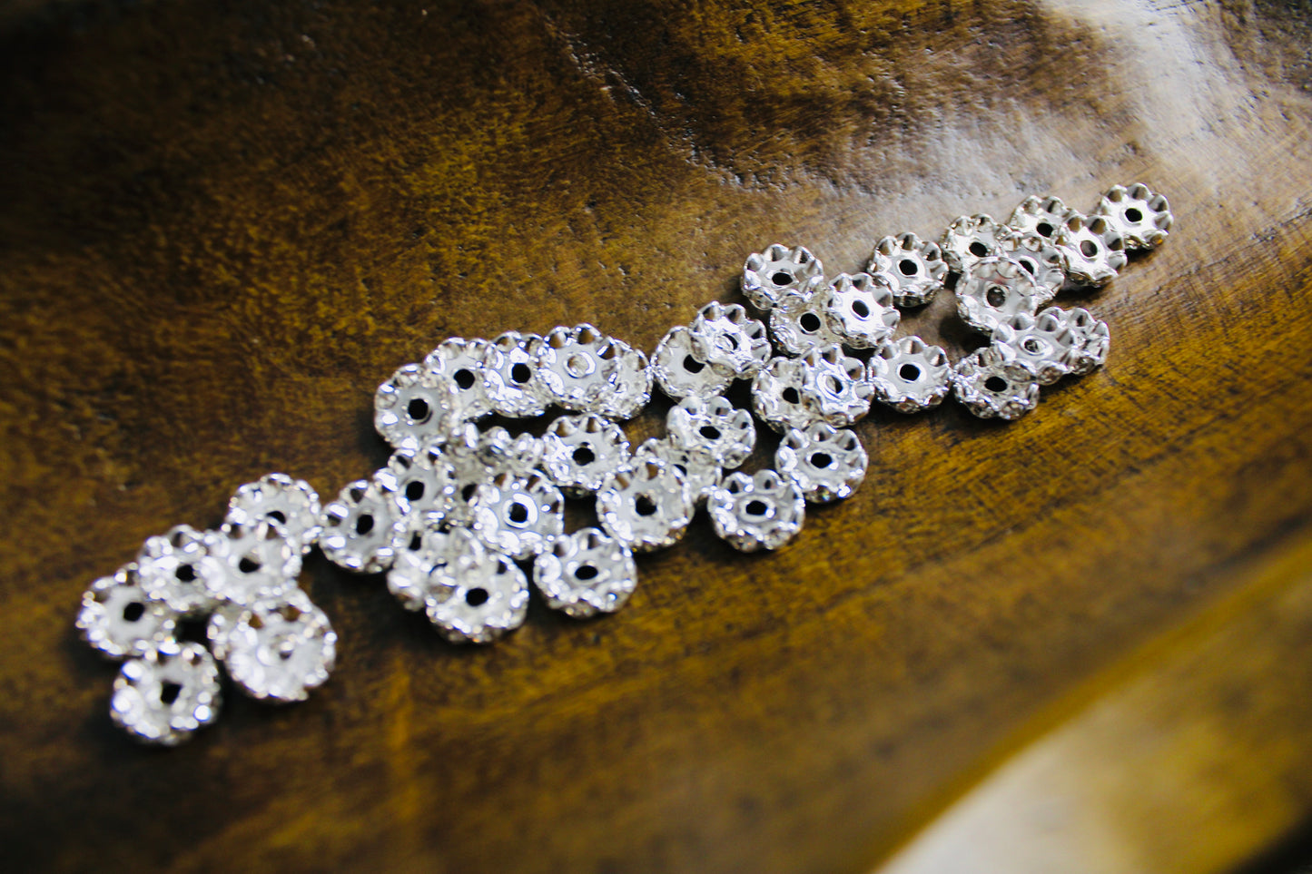 12mm Silver Wavy Clear Rhinestone Spacer Bead 40 Count Bag