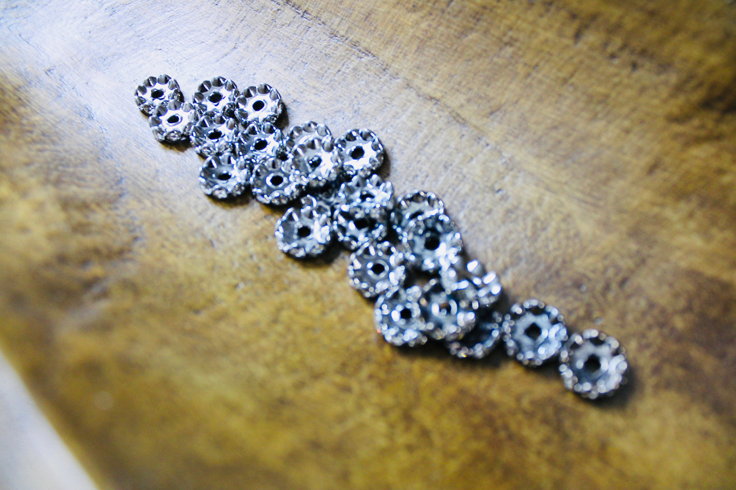 12mm Gunmetal Clear Stone Rhinestone Wavy Spacer Bead 40 Count Bag