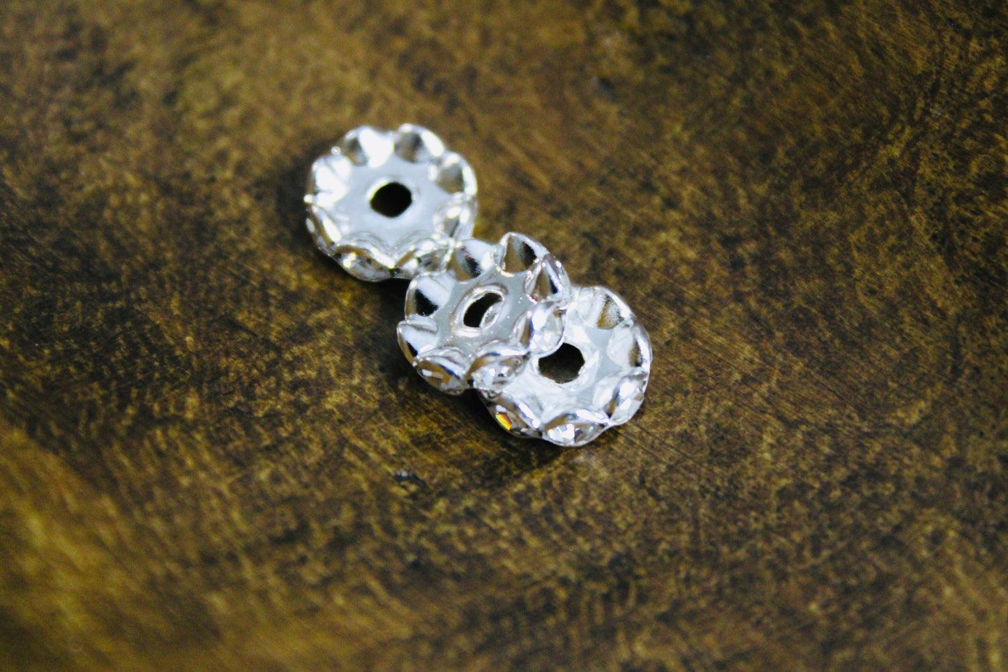 12mm Silver Wavy Clear Rhinestone Spacer Bead 40 Count Bag