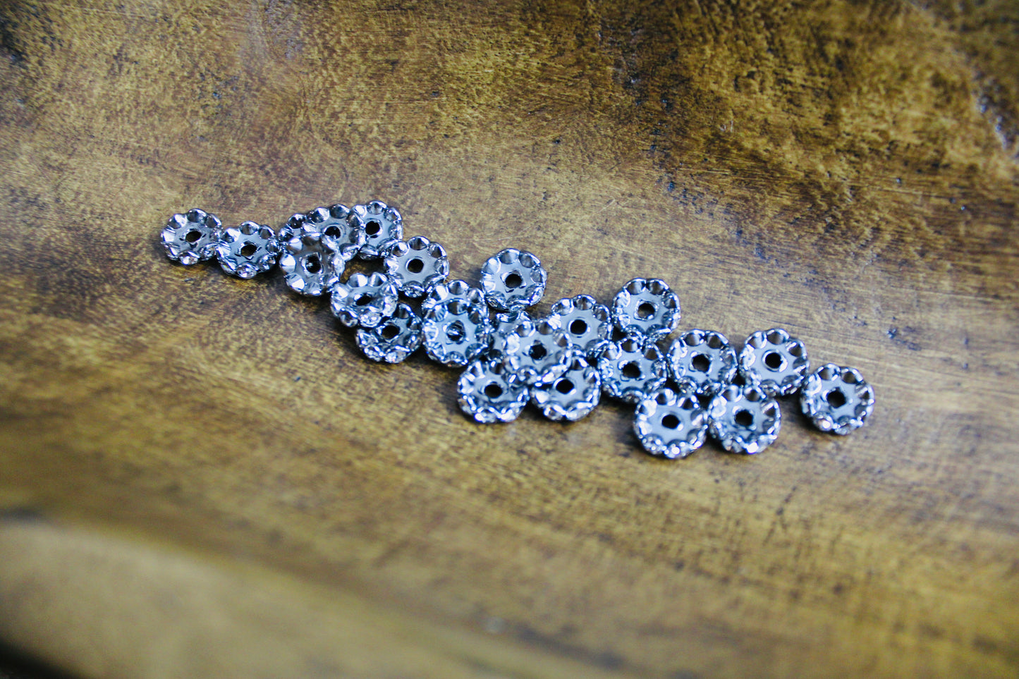 12mm Gunmetal Clear Stone Rhinestone Wavy Spacer Bead 40 Count Bag