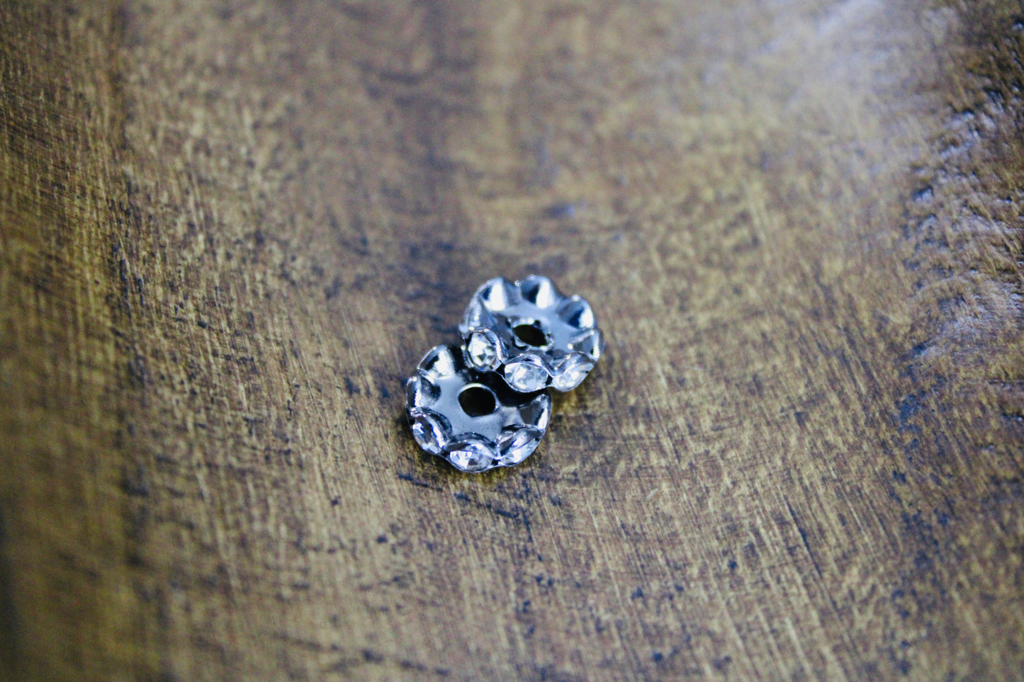 12mm Gunmetal Clear Stone Rhinestone Wavy Spacer Bead 40 Count Bag